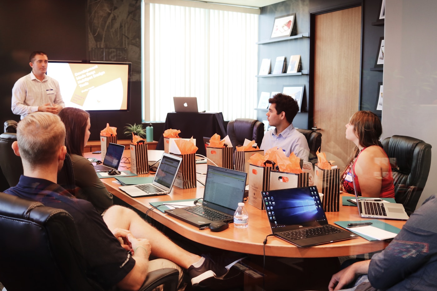 Professionals reviewing information together in an office