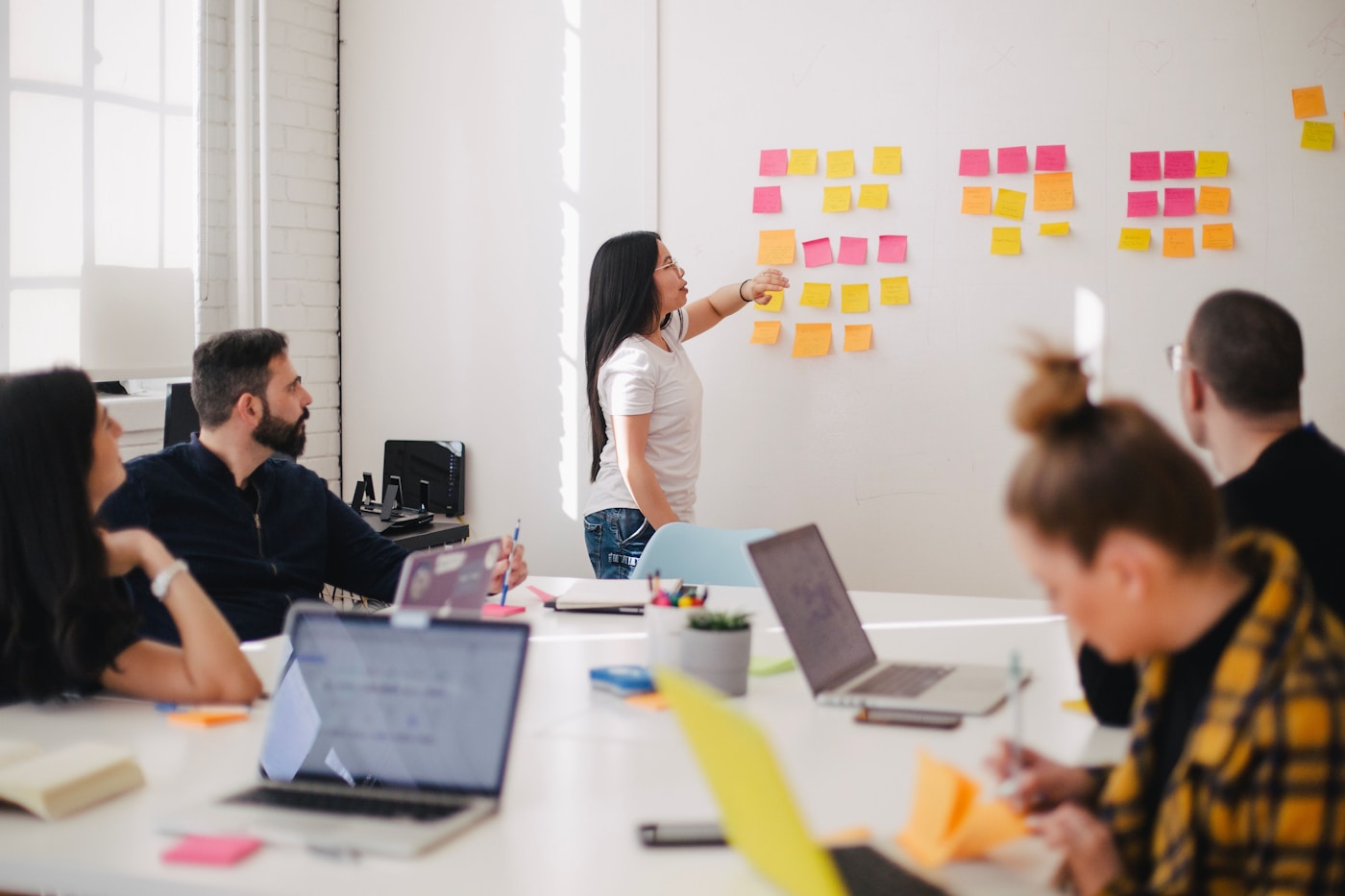 Team collaborating at a table in a professional setting